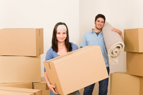 Packed household boxes and furniture ready for a Marylebone flat move