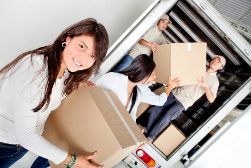 Packed moving boxes and furniture ready for a Marylebone home removal